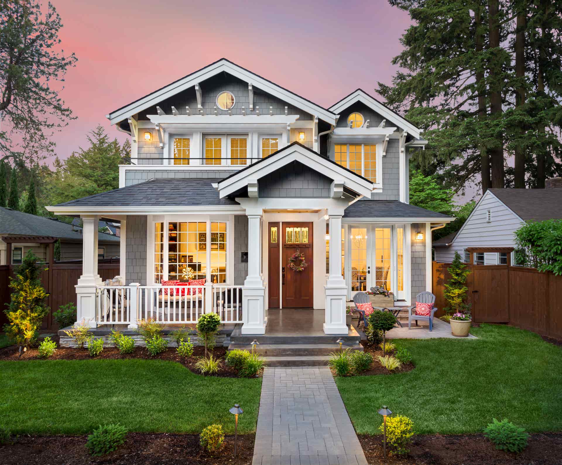Grey house front at sunset